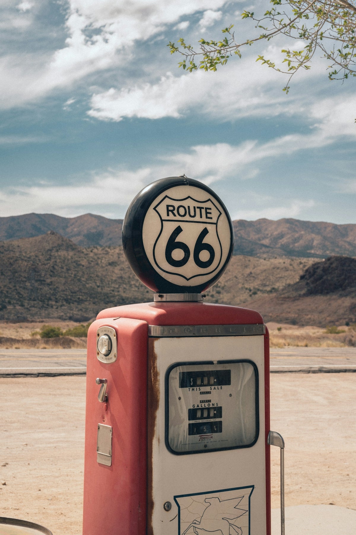 Vintage route 66 gas pump in desert landscape